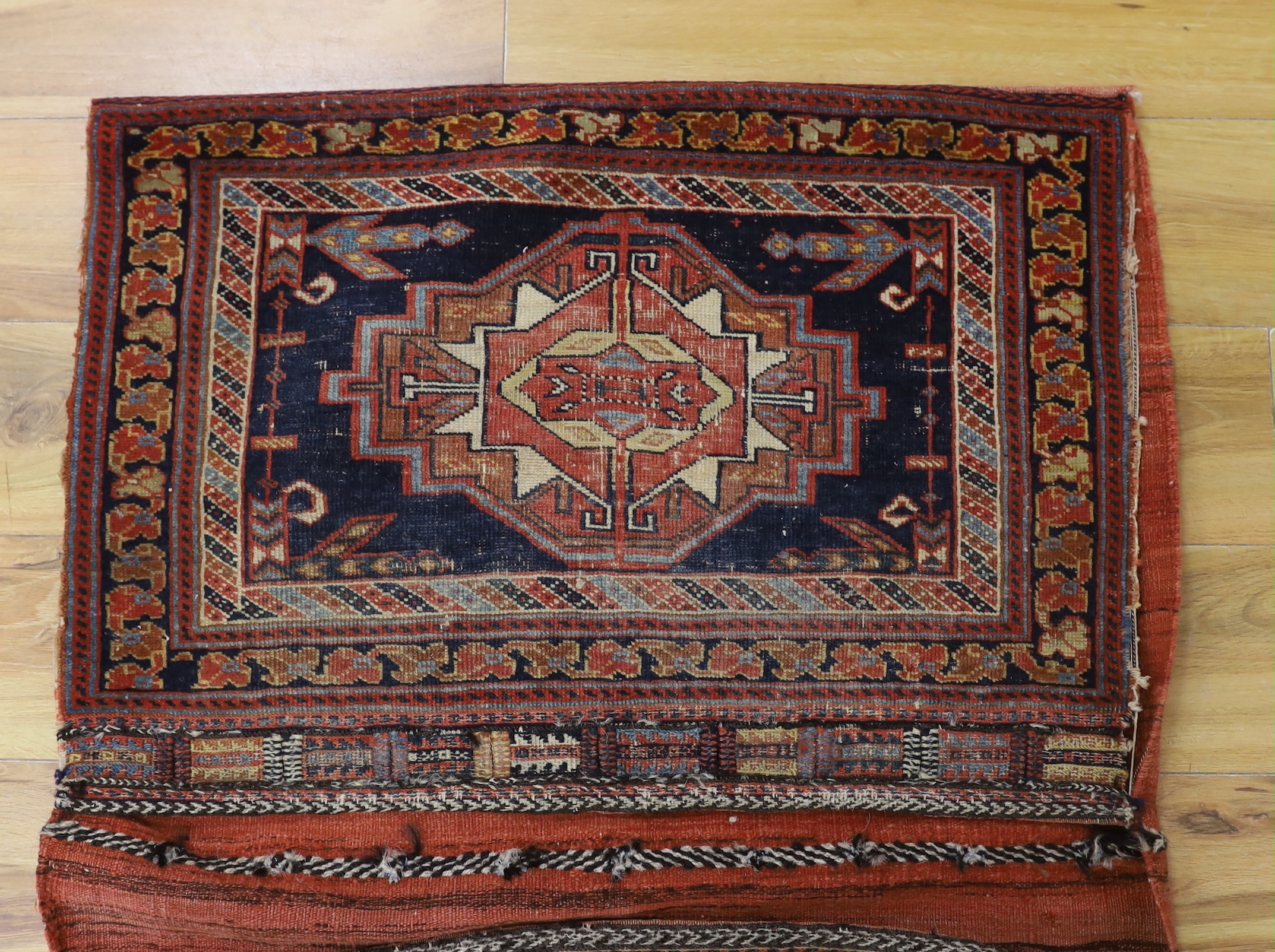 An Afshar blue ground saddle bag, 120 x 79cm